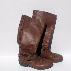 Unique knee-high boots w/ fun side and back detail